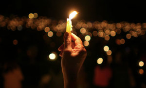 A small light can spark a revolution. Photograph: William Fernando Martinez/AP